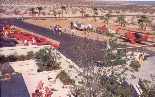 Party at The Fun House 1997... Ferraris on one side of the driveway, biplanes on the other, sun and fun by the pool, and the party has just begun...  click to enlarge!