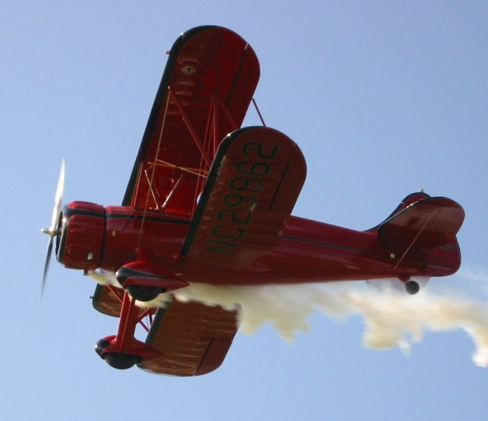 Waco UPF7 biplane dong low pass with smoke on