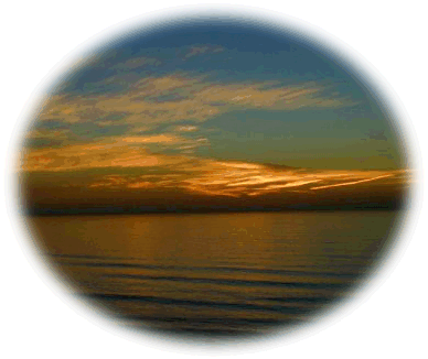 Recent sunset from oceanfront home/office.  Photo by MM.