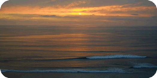 Recent sunset from oceanfront home/office.  Photo by MM.